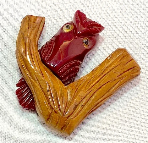 BP274 burgundy bakelite owl on wood tree limb